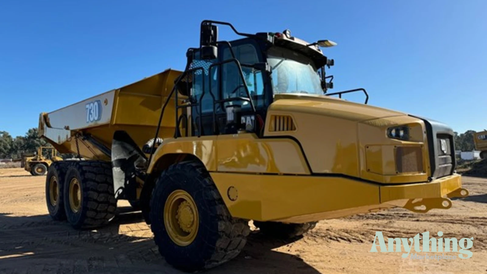 2021 New Caterpillar 730 Dump Truck